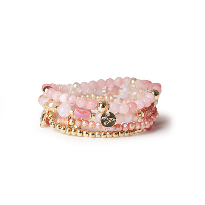 Bracciale elastico multi filo con pietre dure tono rosa