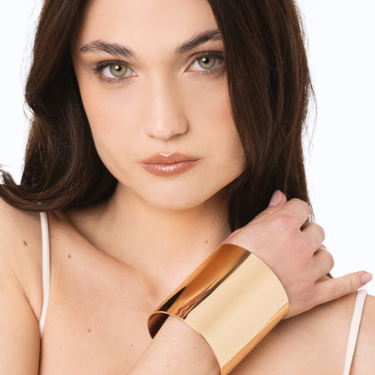 Bracciale rigido in metallo lucido