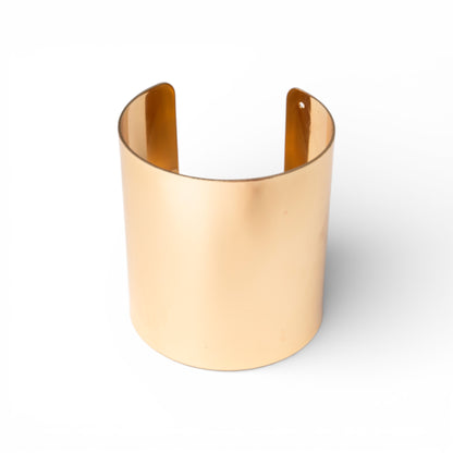 Bracciale rigido in metallo lucido