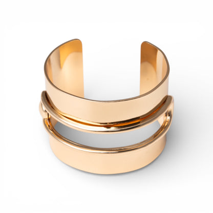 Bracciale rigido in metallo lucido forato