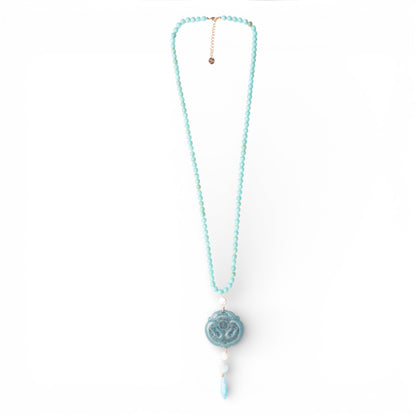 Collana lunga con pietre in acrilico, pendente mandala turchese
