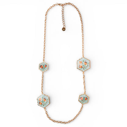 Collana lunga a catena con inserti esagonali in resina celeste design floreale