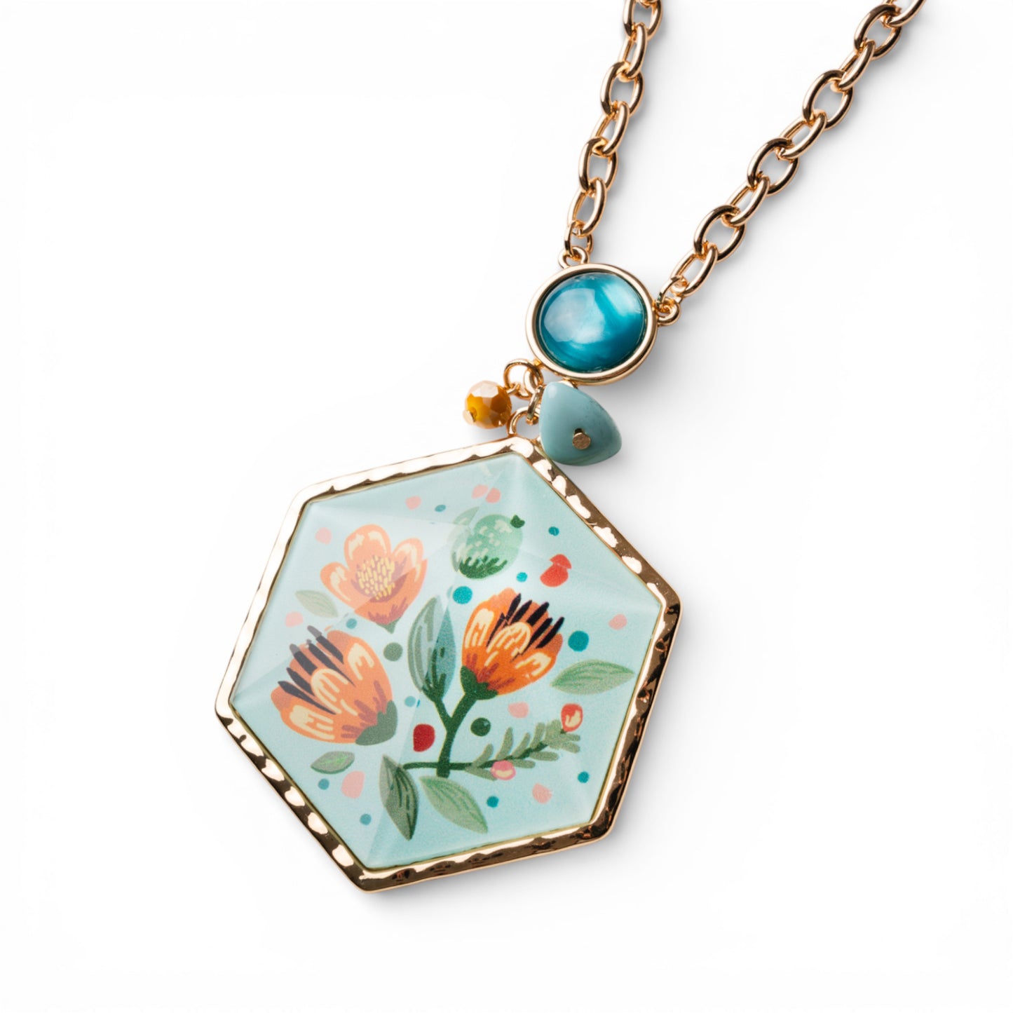 Collana lunga a catena con pendente a medaglione esagonale in resina celeste design floreale