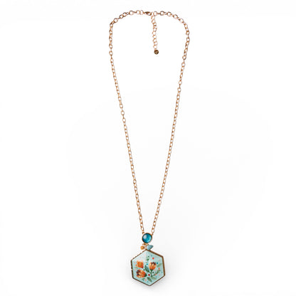 Collana lunga a catena con pendente a medaglione esagonale in resina celeste design floreale
