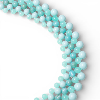 Collana girocollo con sfere in acrilico intrecciate turchesi