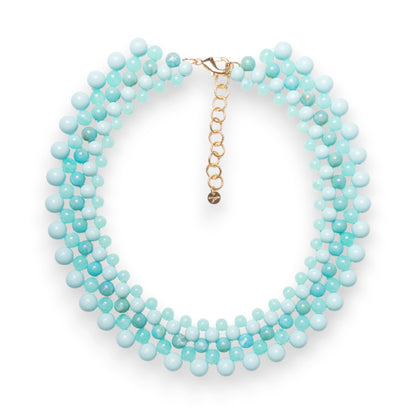 Collana girocollo con sfere in acrilico intrecciate turchesi