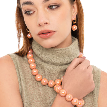 Collana girocollo con sfere in acrilico lucide rosa