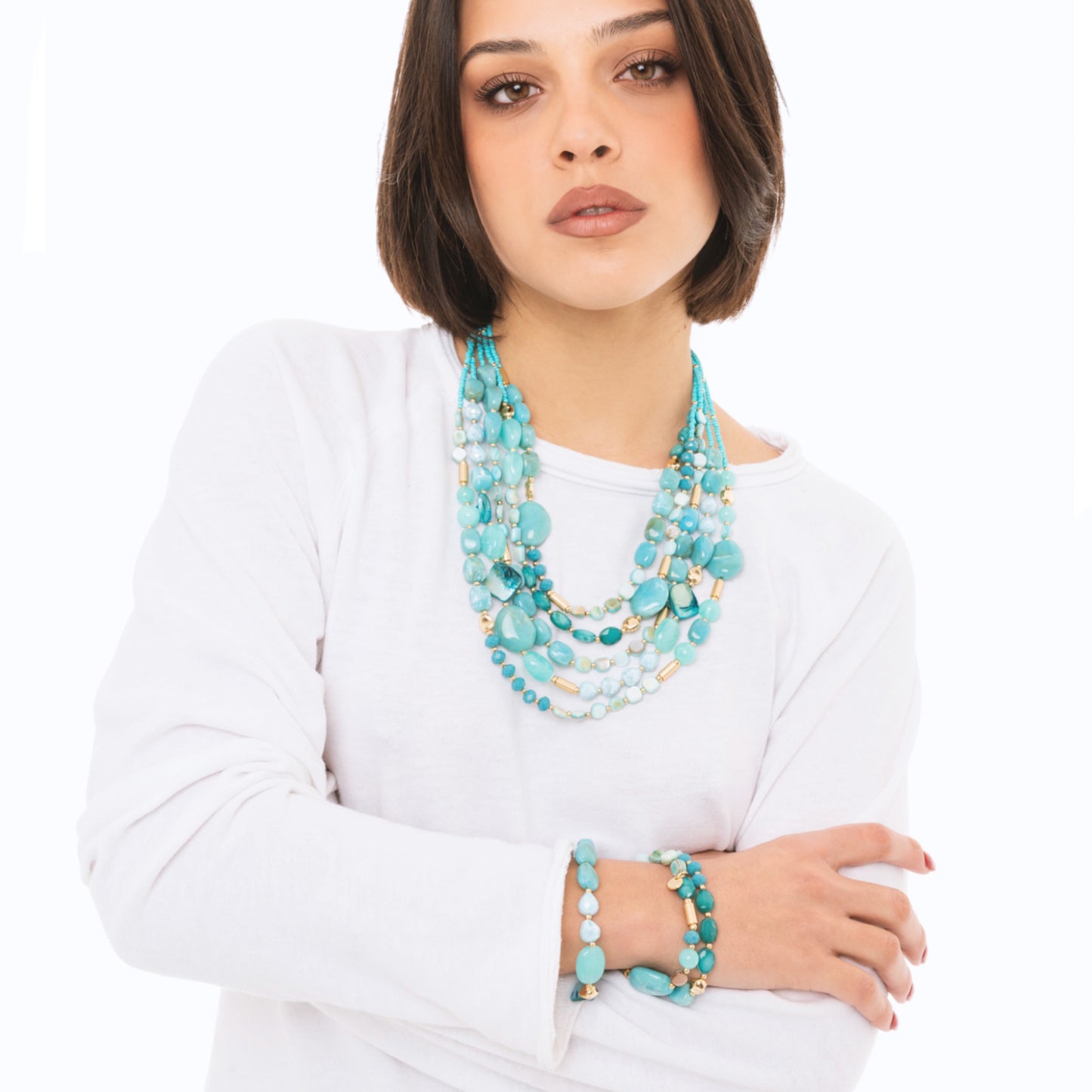 Collana multi fili con pietre in acrilico e vetro turchesi
