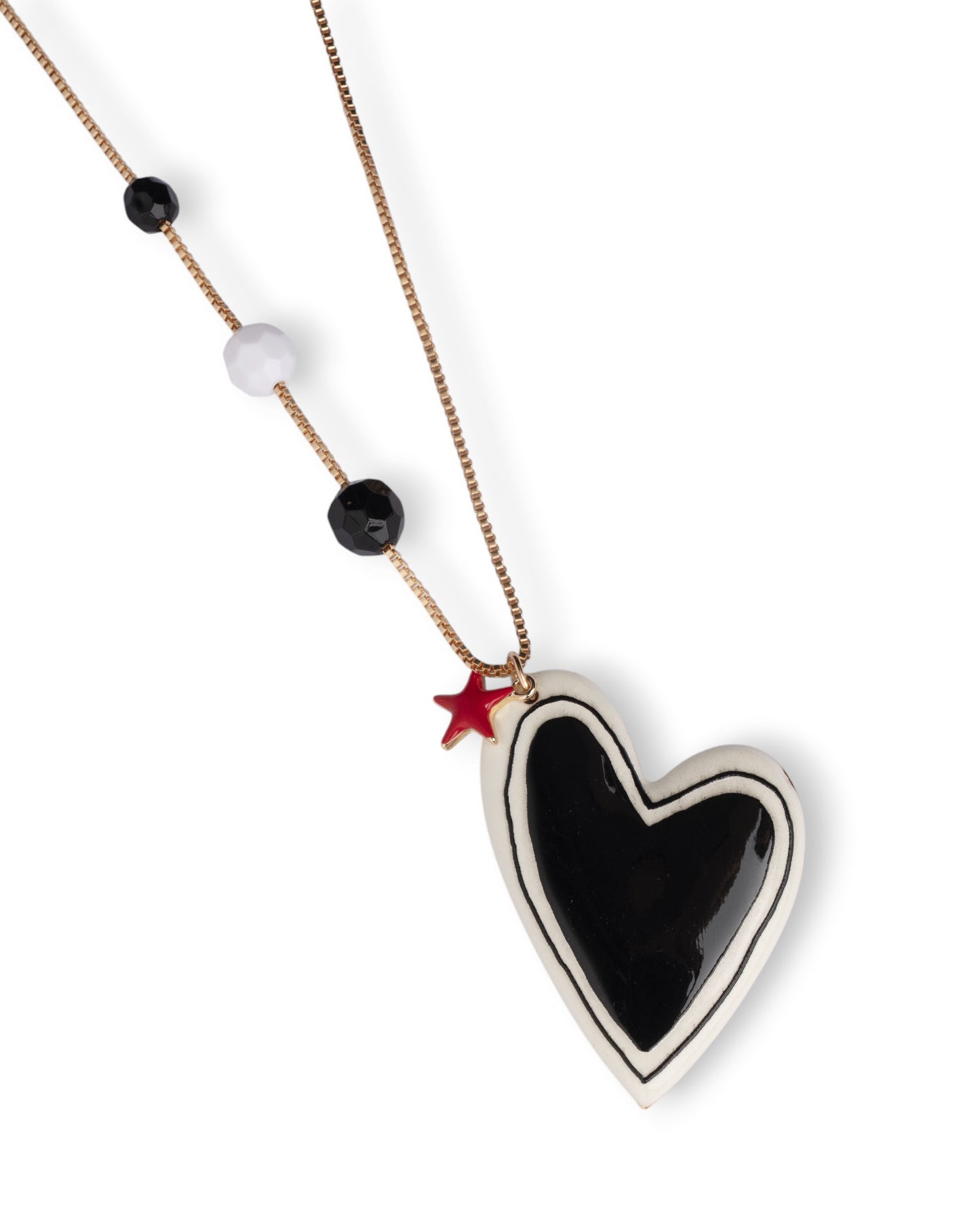 Collana lunga con pietre dure e pendente a cuore smaltato bianco e nero