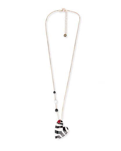 Collana lunga con pietre dure e pendente a cuore smaltato zebrato bianco e nero