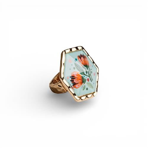 Anello elastico in metallo con pietra esagonale in resina decorata con stampa floreale