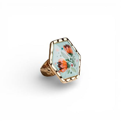 Anello elastico in metallo con pietra esagonale in resina decorata con stampa floreale