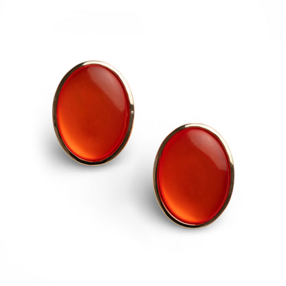 Orecchini a clip ovale in metallo con pietra in resina arancio