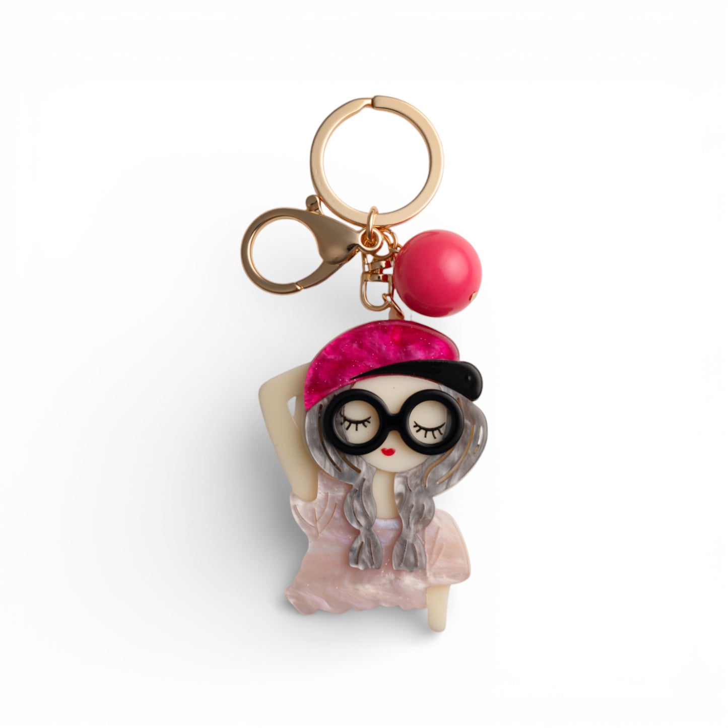 Portachiavi in metallo con charms ragazza col berretto in acrilico