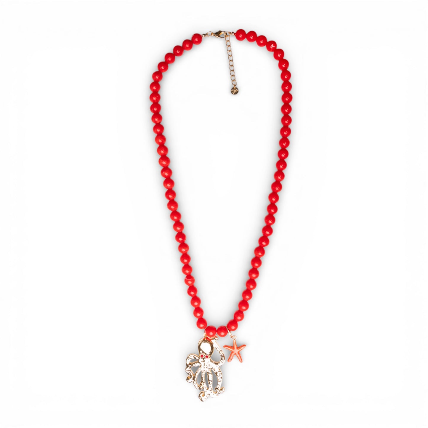 Collana lunga con sfere rosse in acrilico e pendente polipetto in metallo