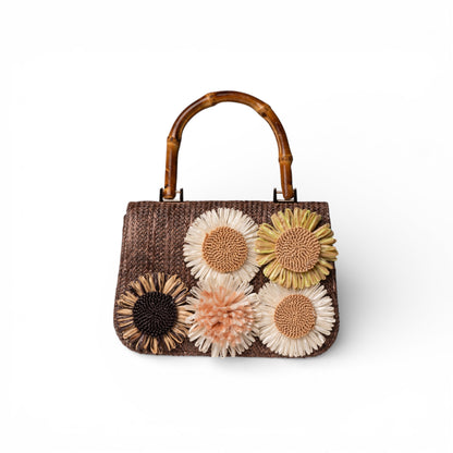 Borsa marrone con manico e fiori a rilievo