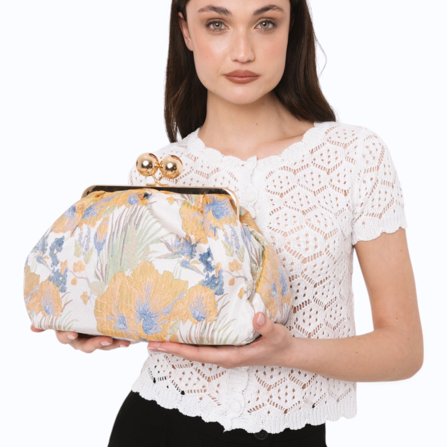 Borsa clutch morbida con motivo floreale arancio e celeste