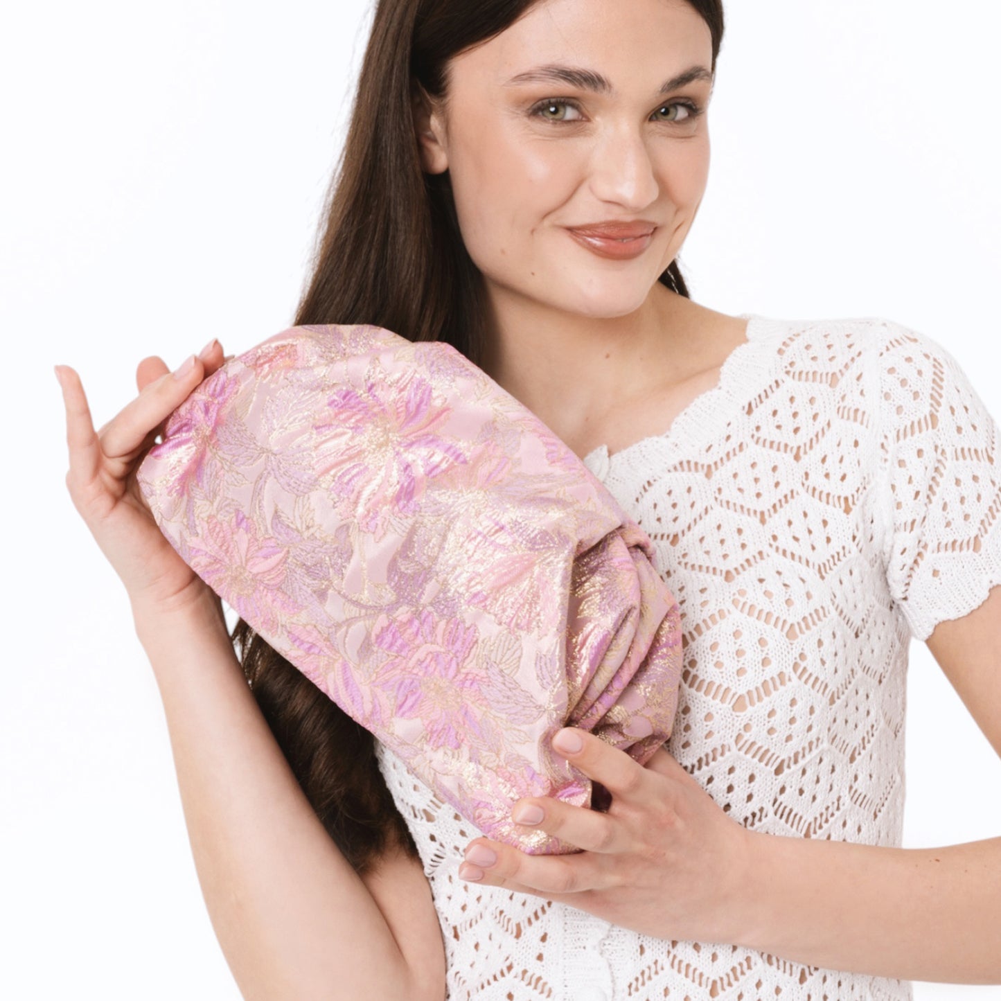 Borsa pochette morbida con texture a fiori tono rosa