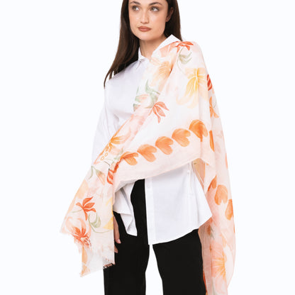 Sciarpa in cotone bianca con stampa floreale tono arancio