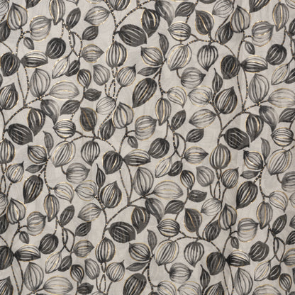 Sciarpa in cotone beige con stampa a foglie nera