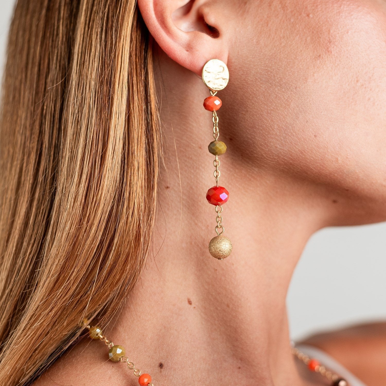 Orecchini pendenti con microcristalli multi arancio - Mya Accessories